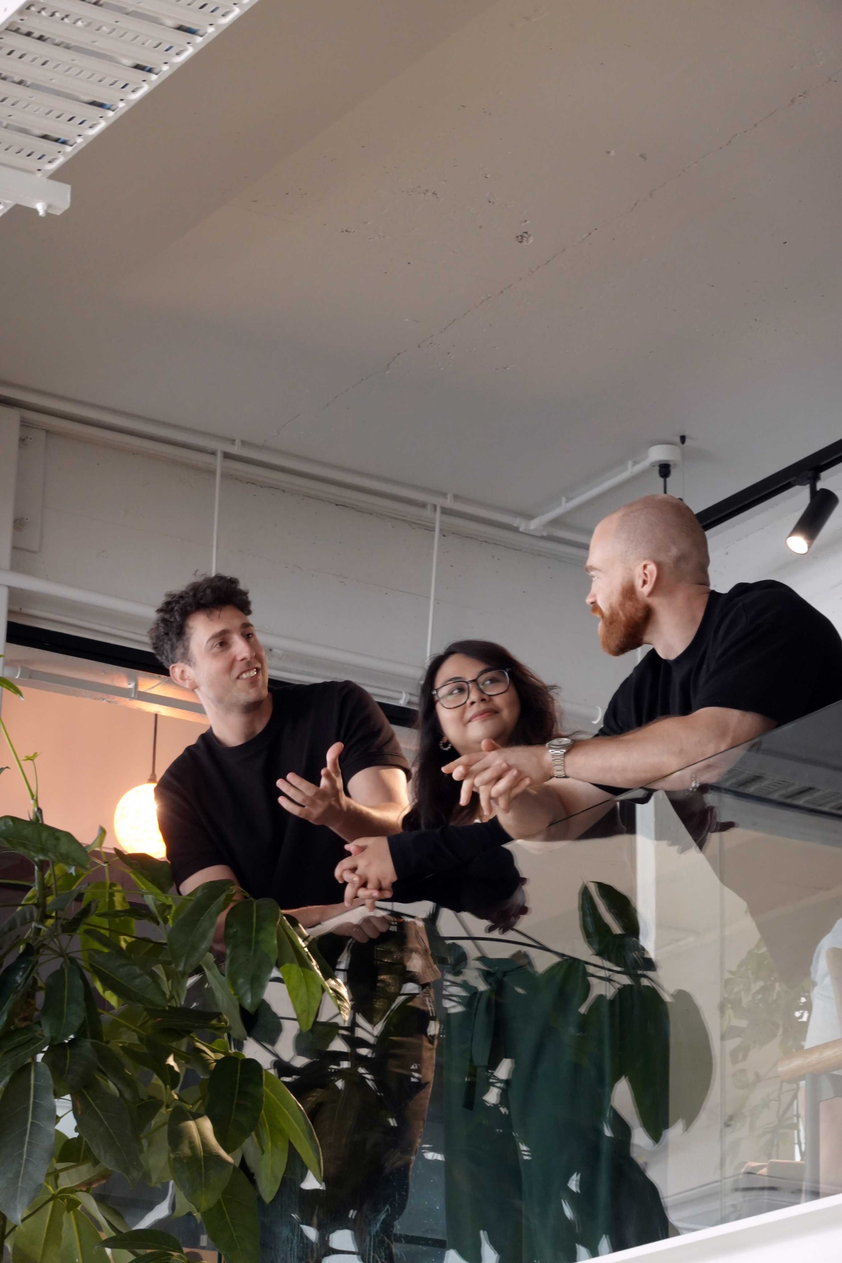 The Sence team laughing together at the office